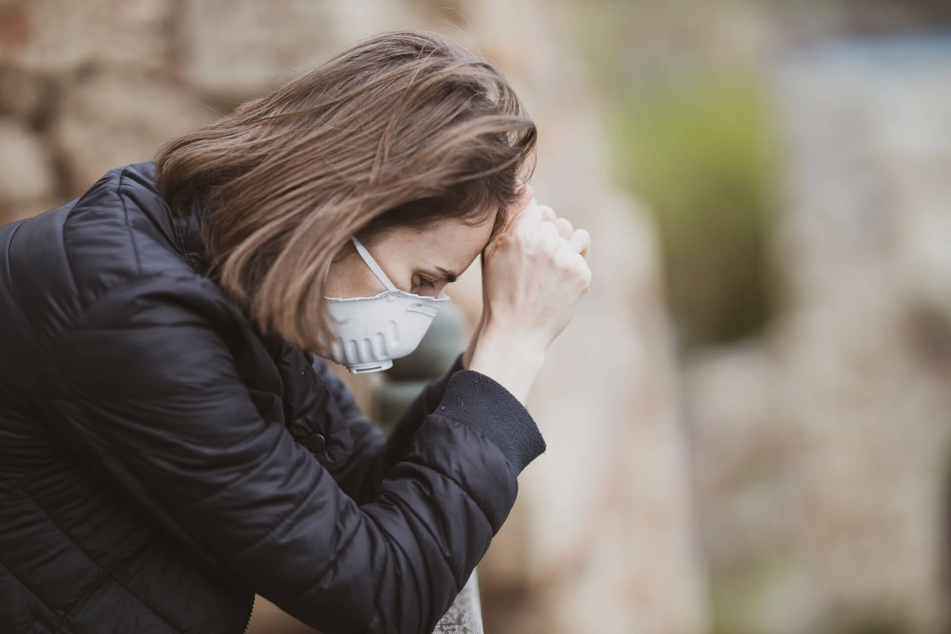 Anxious woman in Mask